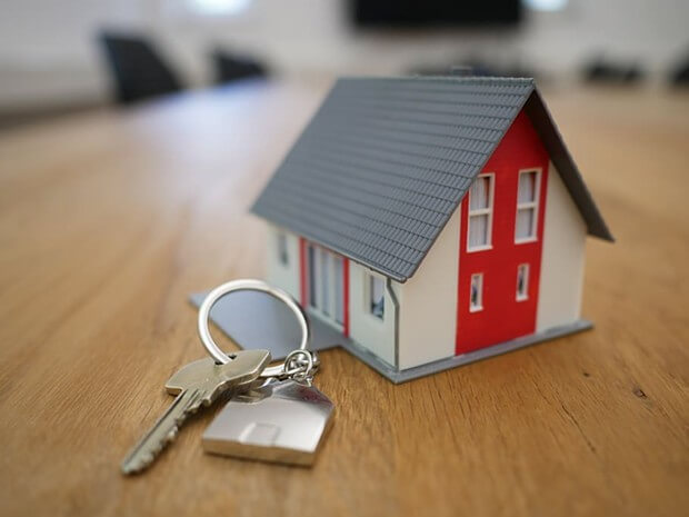 Photo of a toy house with keys