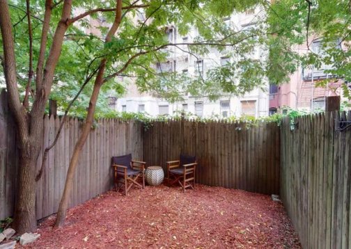 Photo of Upper East Side townhouse with a fence